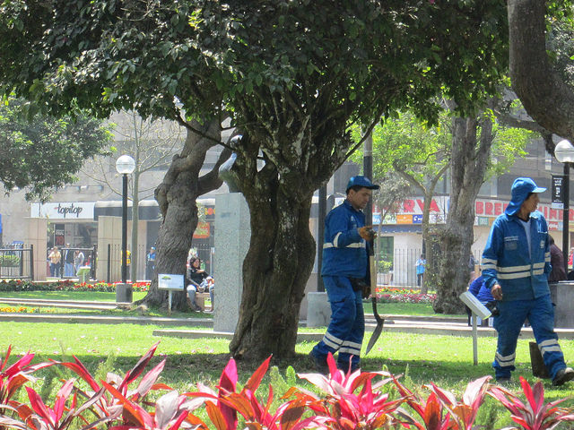 Uniformed Gardeners and Sanitation Workers in Parque Kennedy